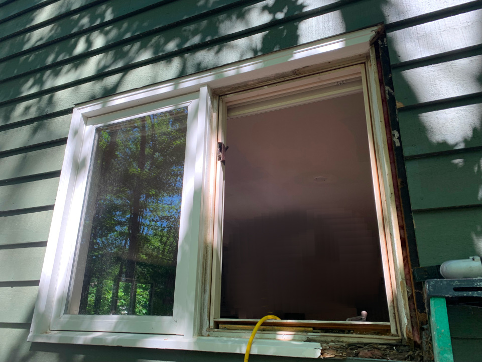 Early demo begins as some trim is removed and loose rotted material is cleaned away, exposing the damaged areas.