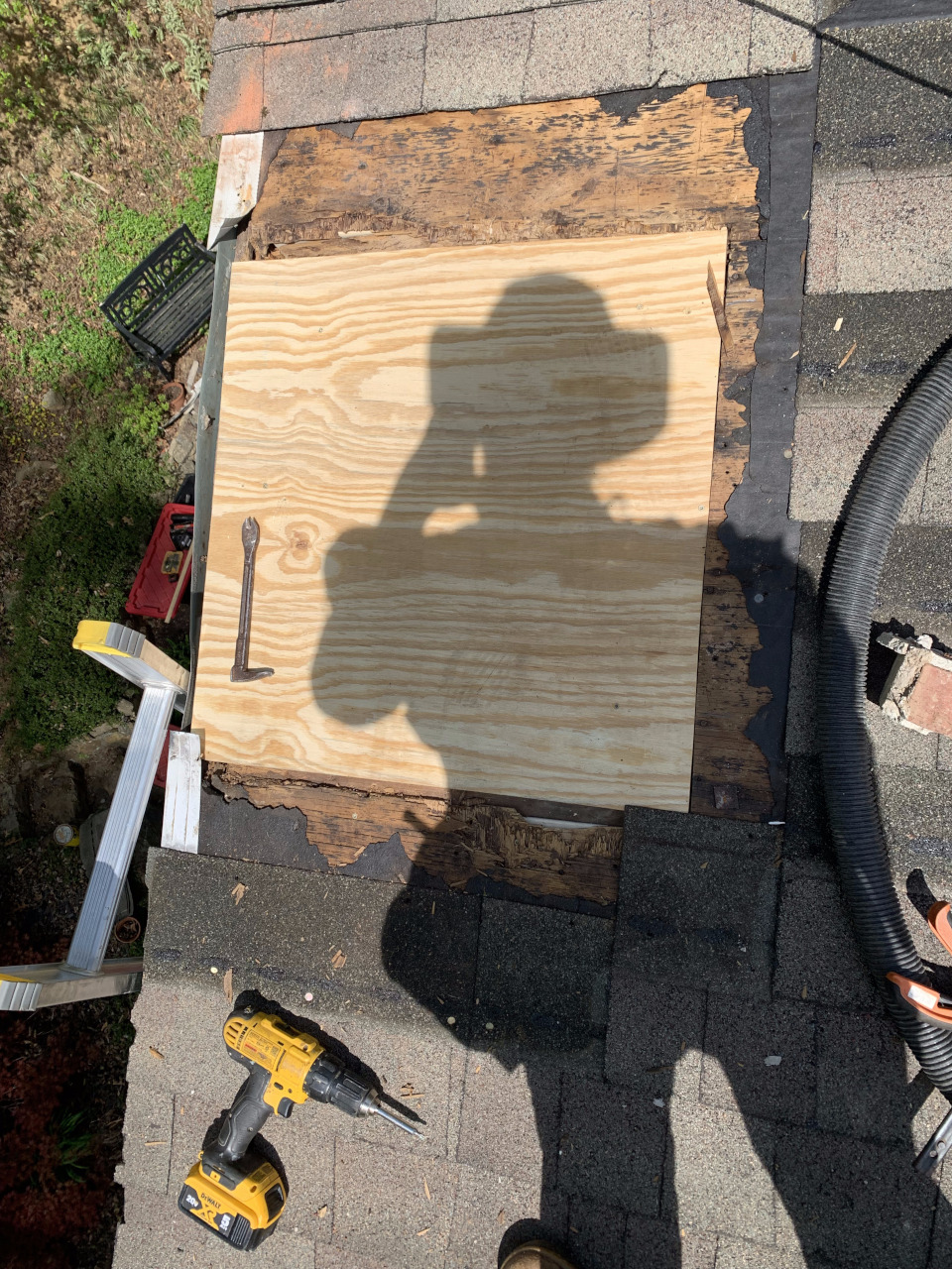 A top-down view of the roof shows a new sheathing section installed over the opening.