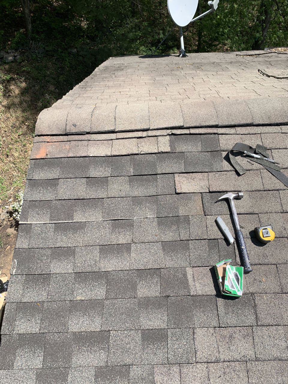 Shingles are installed to tie into the existing roof.