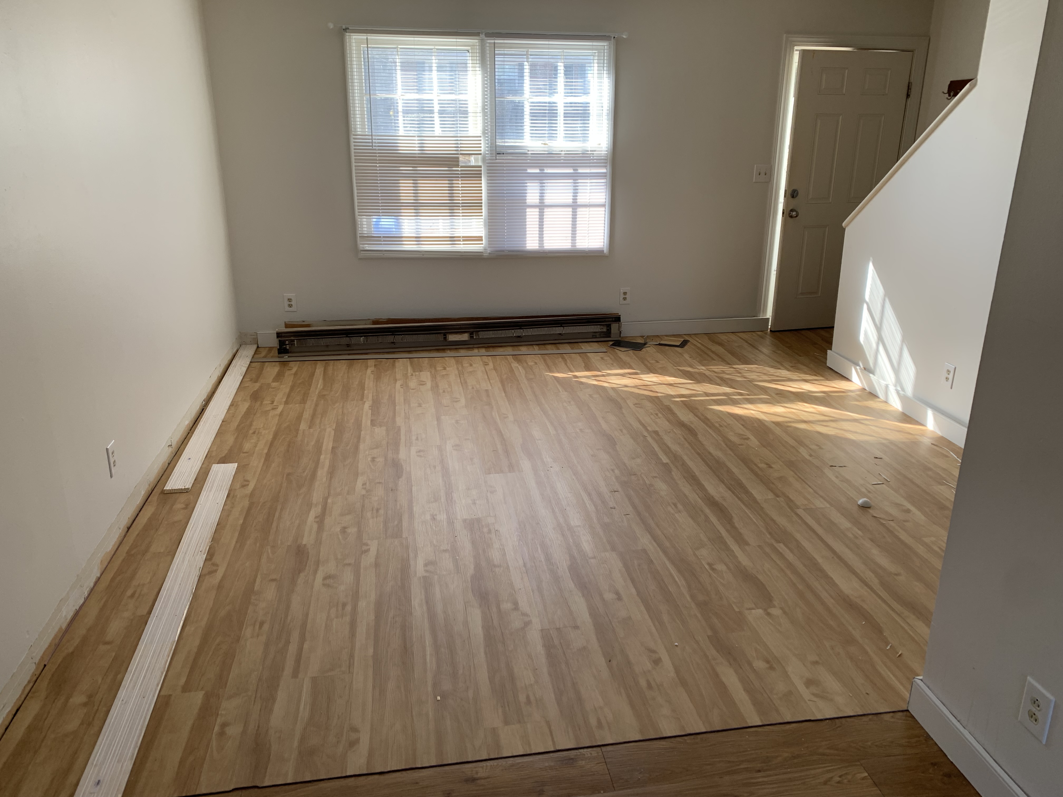 New luxury vinyl plank installed with trim removed