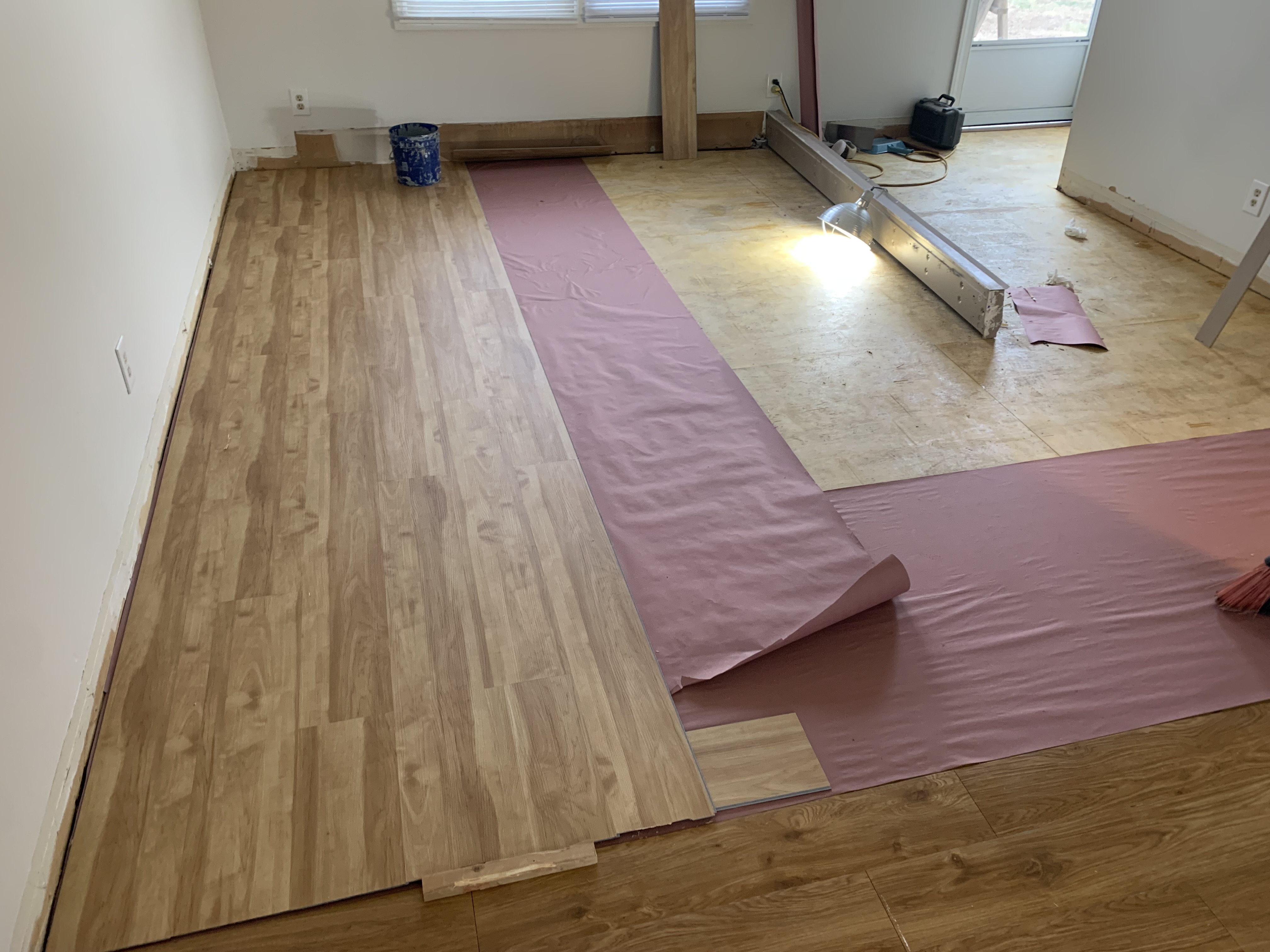Snaplock luxury vinyl plank installation underway