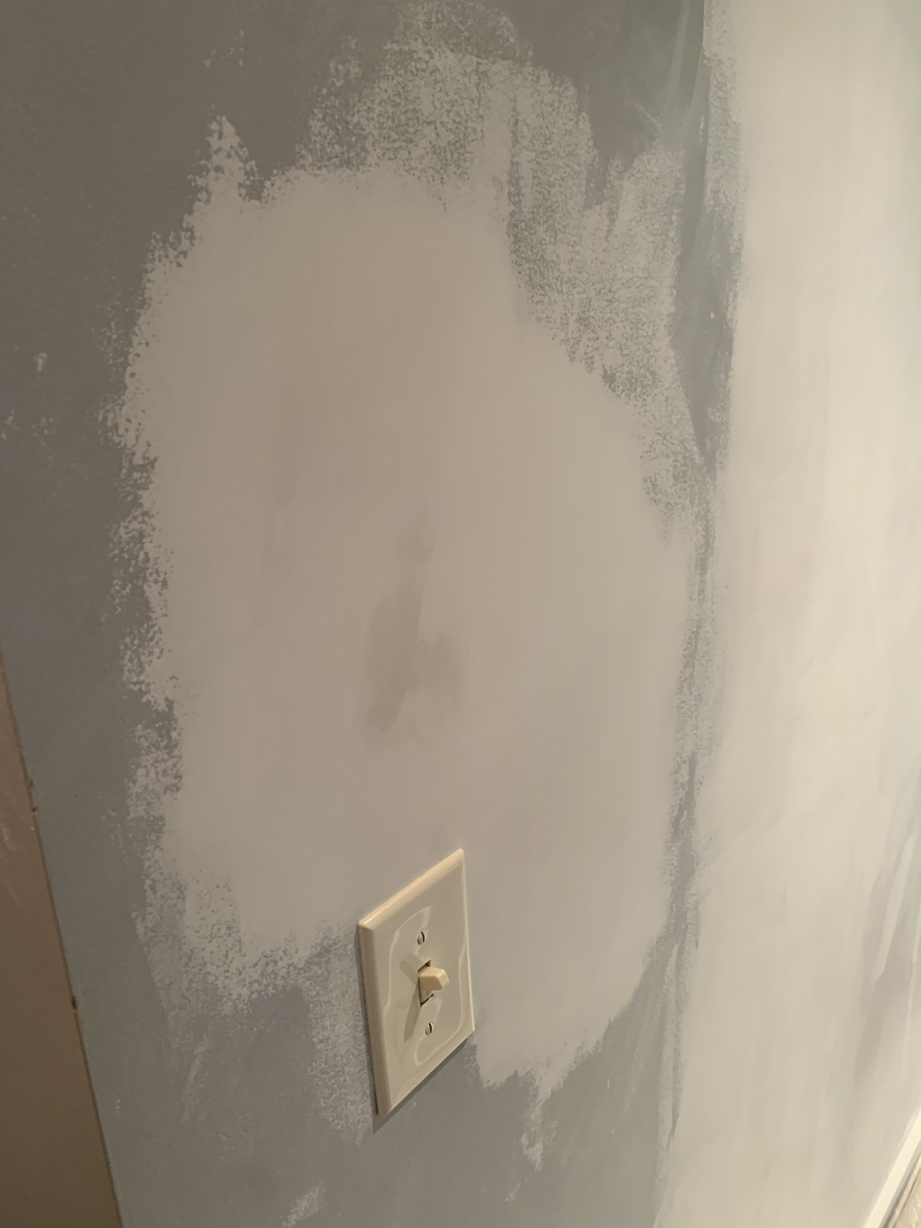 After sanding, the area is completely flush and ready for paint.